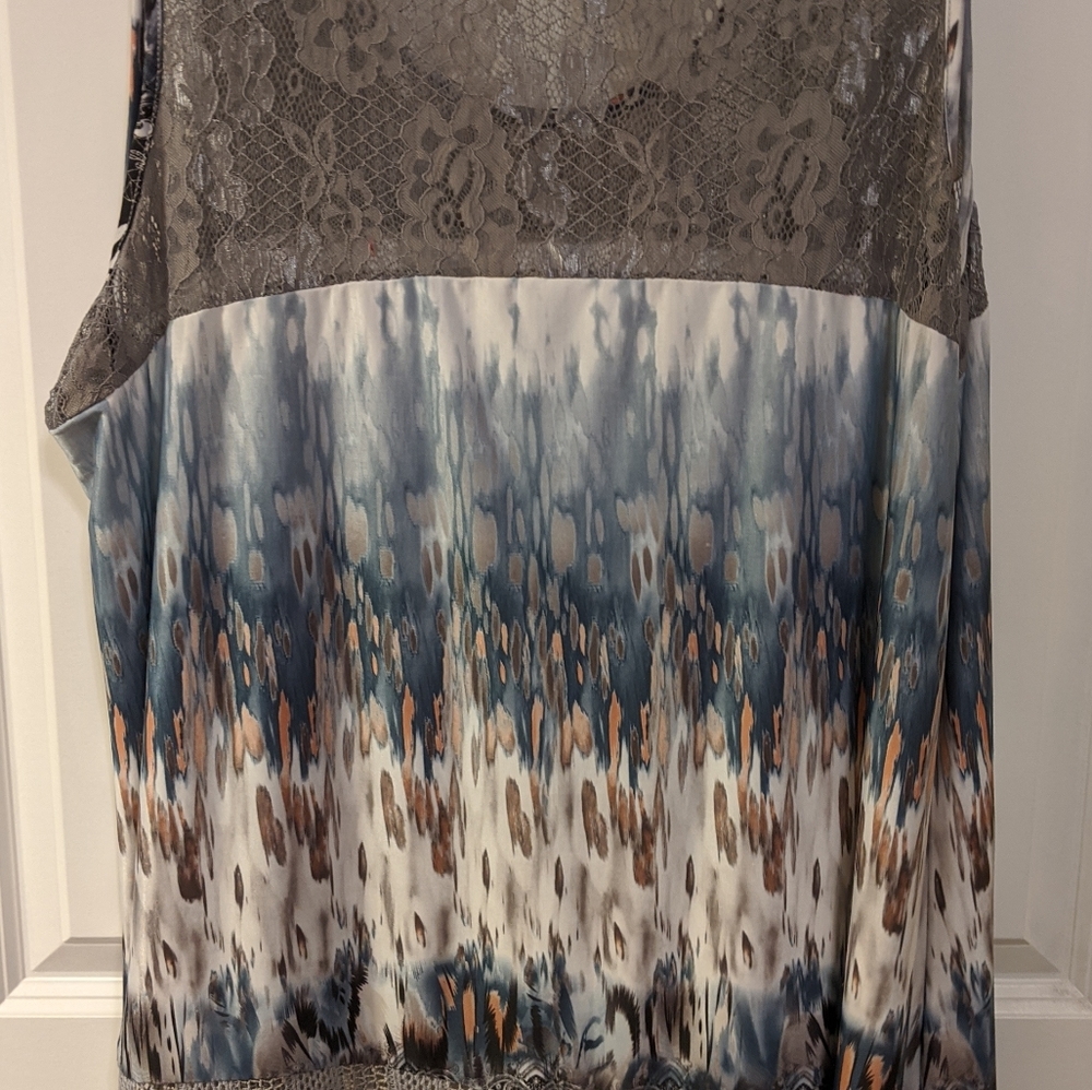 Hip-length, sleeveless, silk summer top